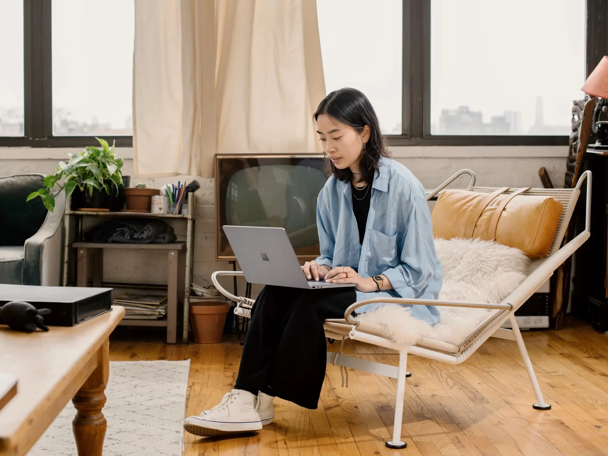Person working on a laptop at home